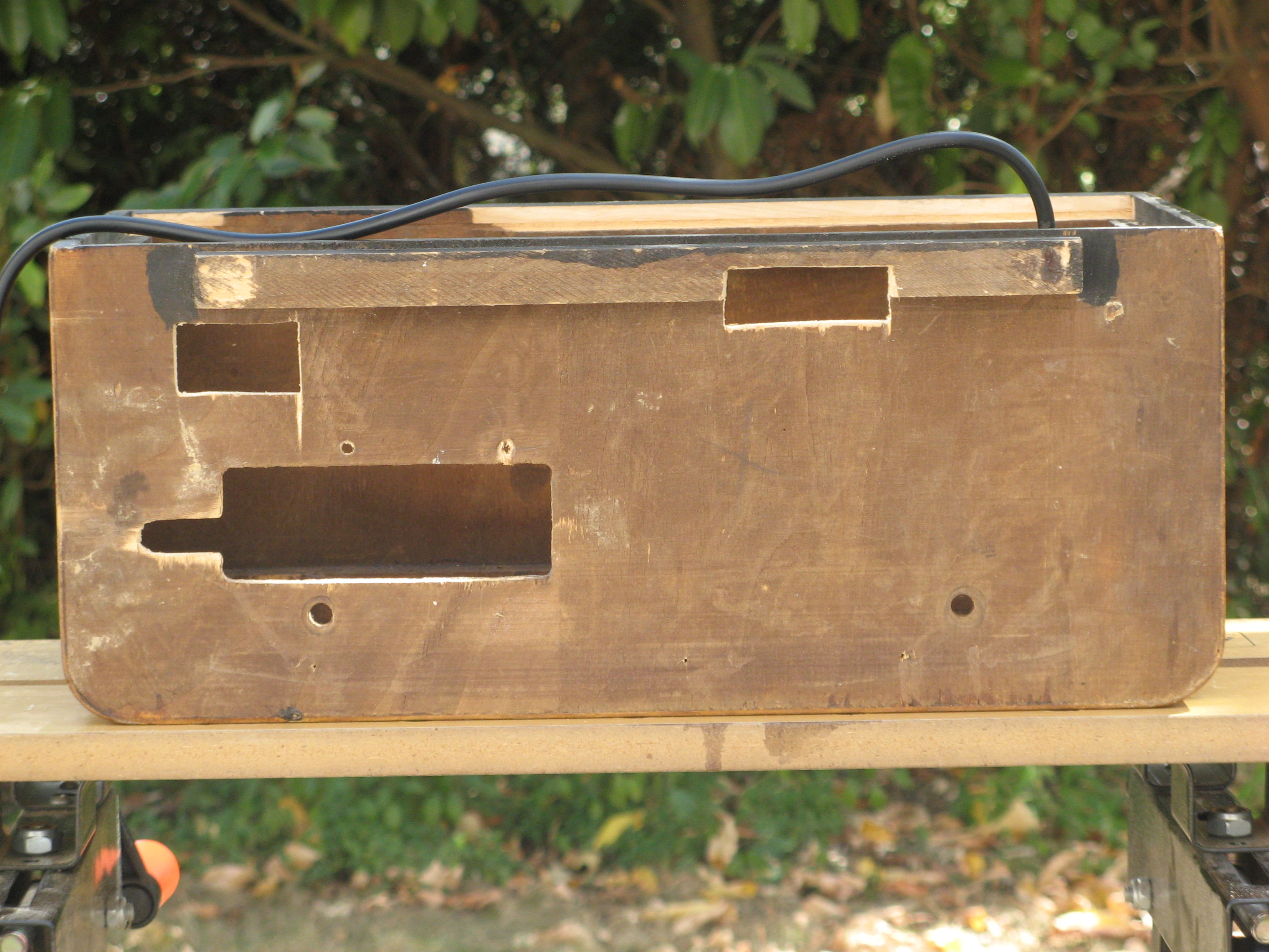 Empty case, bottom with holes
