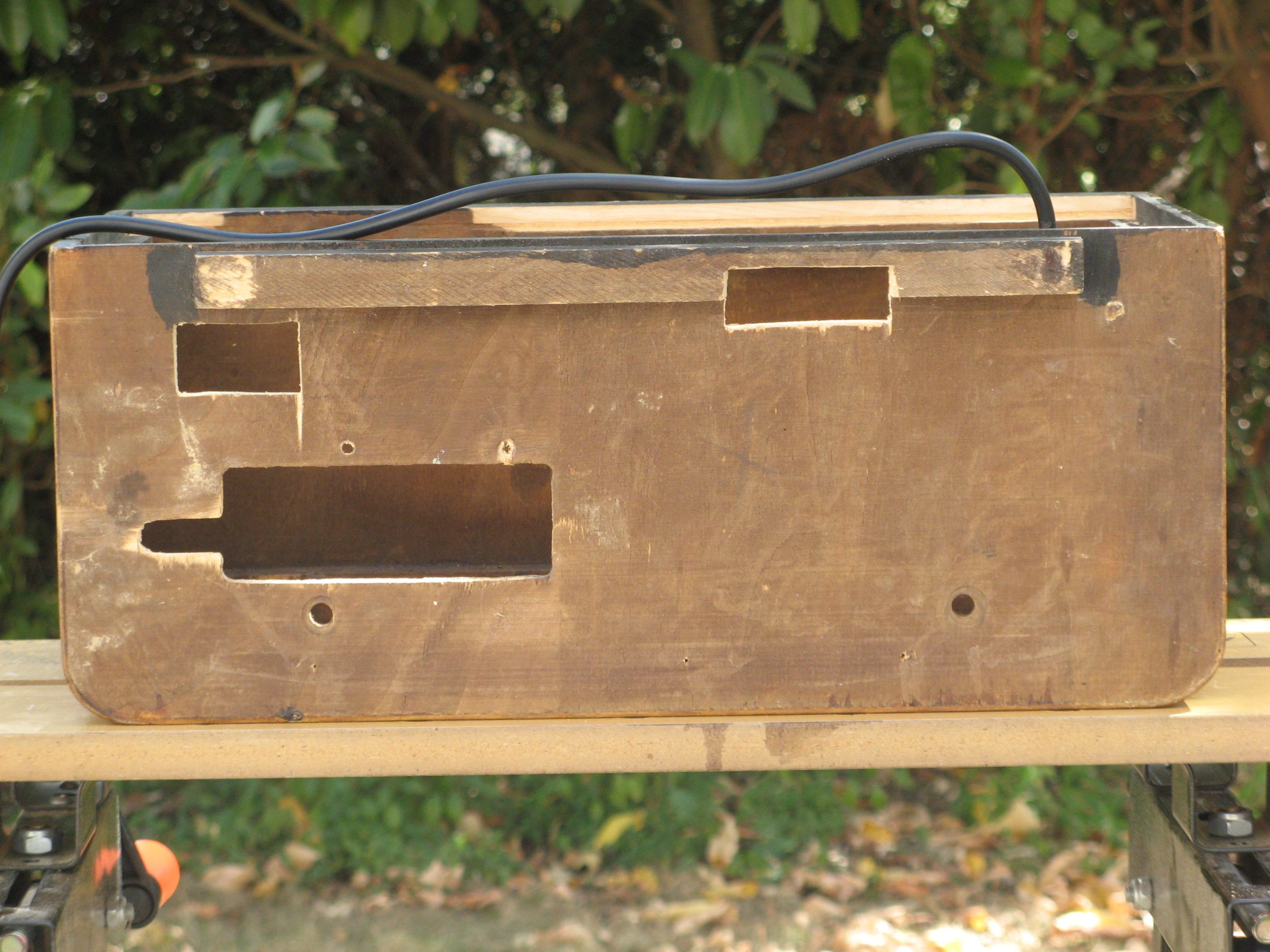 Empty case, bottom with holes
